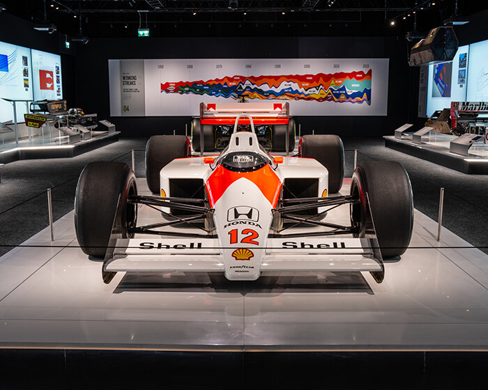 torched formula 1 car and other motorsport artifacts show at F1 exhibition in london