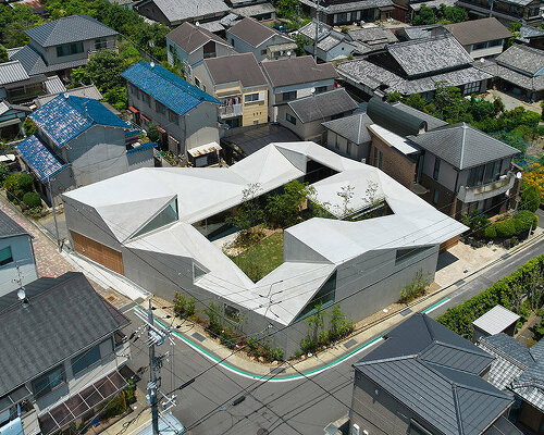 faceted rooftop encloses architect tomohiro hata's house in muko, kyoto