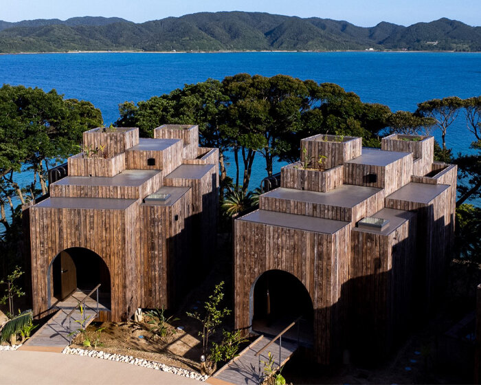 miru amami resort welcomes cavernous and stilted wooden villas overlooking japanese bay