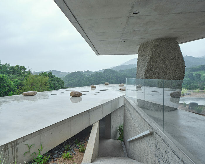 nameless architecture's concretewall café is an austere rock garden in korea