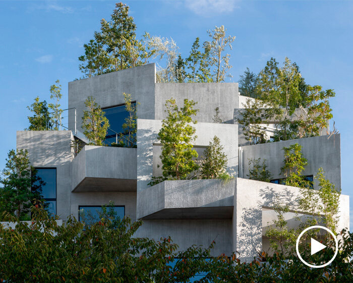 free-flowing verdant tiered terraces envelop NOT A HOTEL's facade in fukuoka