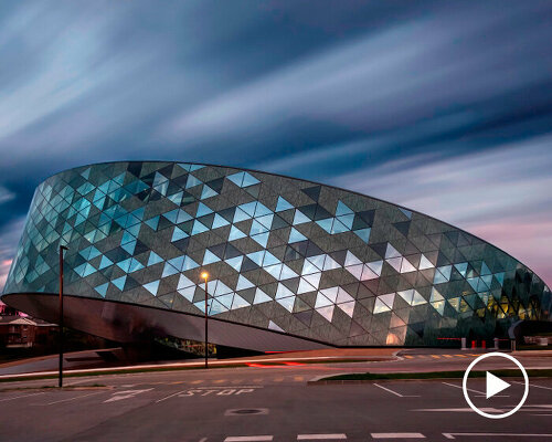 tilted ring formation completes nearly zero energy building campus by barru arkitektura