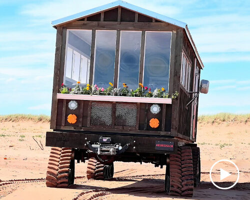 mobile tiny house on tracks ‘rubishack’ drives on hills, sand and water for on-vehicle camping