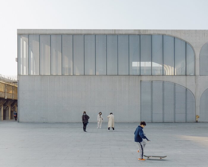 tianzhou yang captures concrete curves and coal hopper remnants at long museum, shanghai