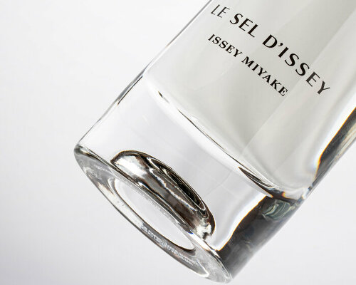 tokujin yoshioka’s issey miyake perfume emits light into the bottle from the oval glass bottom