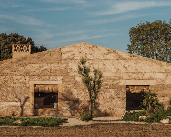 spanish studio munarq builds mallorca home 'ca na pau' from blocks of raw earth