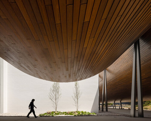 kengo kuma & buro happold simulate floating timber roof over lisbon's CAM gulbenkian