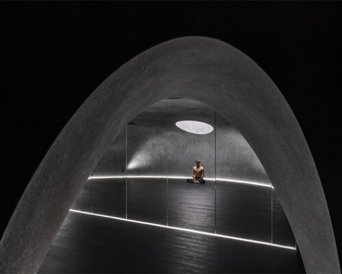 circular skylight illuminates cave-like meditation space by studio X4 in taipei