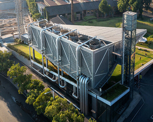 xing design's sculptural energy center sits in park in china like a mechanical cloud