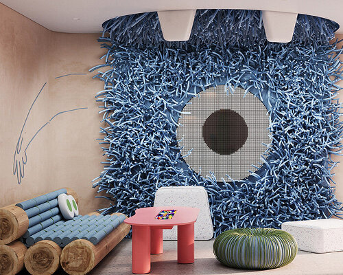 fluffy blue monster looks over dental clinic by ZIKZAK architects in stuttgart