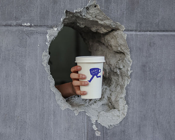 filipino café serves beverages straight through a hole in a concrete wall