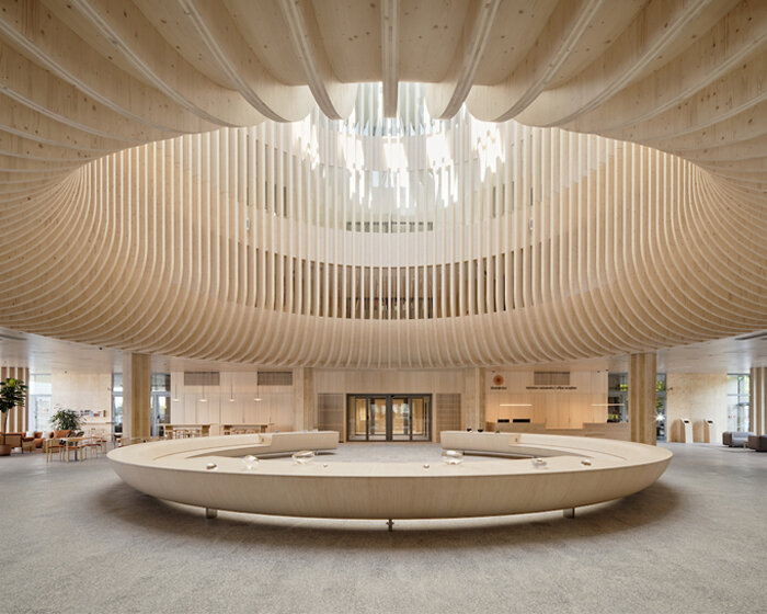 katajanokan laituri landmark in helsinki greets visitors with a cascading wooden skylight