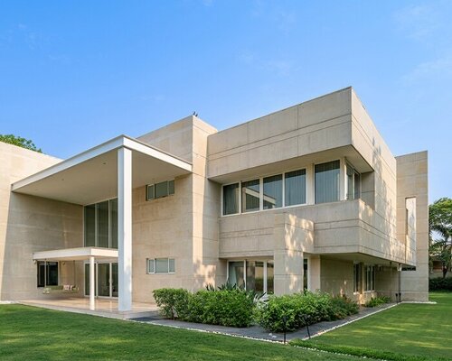 green spaces and light soften INI design studio's brutalist lakhani villa in ahmedabad