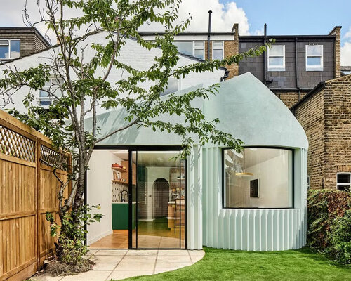 a series of square and circular skylights introduces geometric light casts within minty house