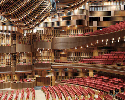 neri&hu mimics classical arena with arcaded performing arts center in shanghai's new bund