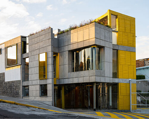 OVER design store in ecuador displays dynamic interplay of concrete, steel, and glass