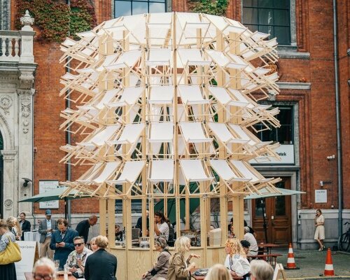 kinetic pavilion of wooden deck chairs by lasovsky johansson blooms in copenhagen