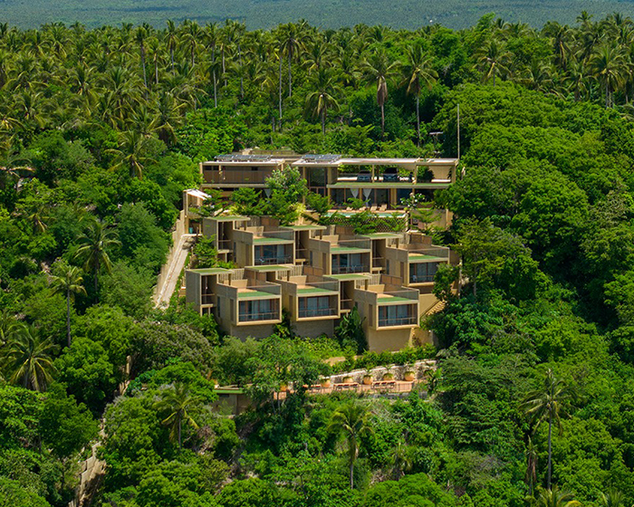 SLIC scatters cluster of brick and limestone villas amid jungle in the philippines