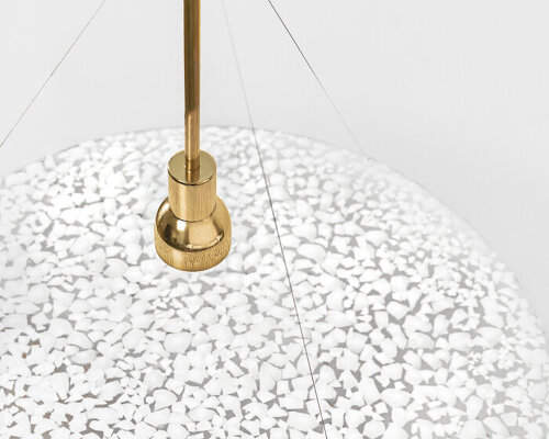 studio yellowdot bonds recycled eggshells and resin for ‘hatch’ pendant light at maison&objet