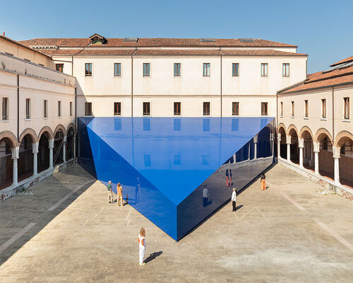 UNA/UNLESS' blue triangular pavilion lands in renaissance-era courtyard at venice biennale