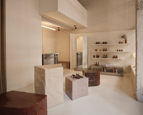 warm earthy hues saturate nancy katri’s esiot athens store, echoing artisanal craftsmanship