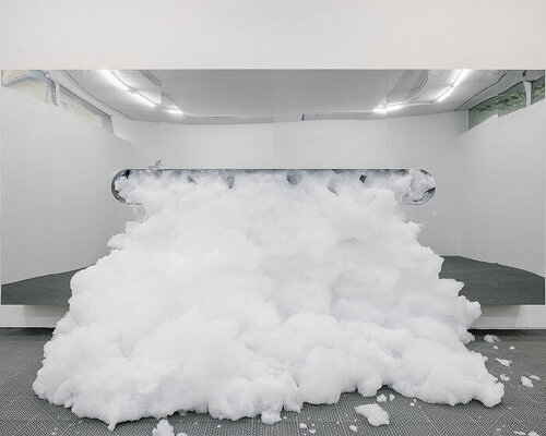 white foam envelops underground gallery in harry nuriev's debut solo show at berlin art week