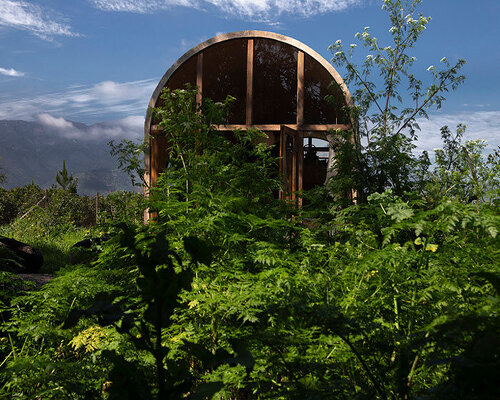 vaulted glazed shelter by tololo ugarte brings verdant chilean nature indoors