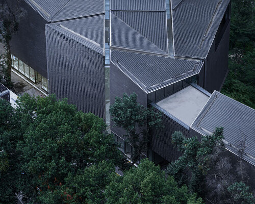 layered brick facade wraps art gallery, part of citang street regeneration project in chengdu