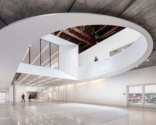 darin johnstone architects turns historic wind tunnel into mullin transportation design center