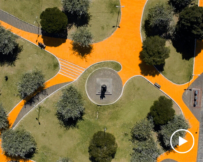 felipe escudero paints quito's historic center with 1.6 kilometer-long orange ribbon