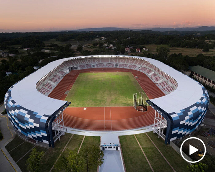 geometric facade wraps stadium by WTA design studio, reflecting traditional ilocano fabric