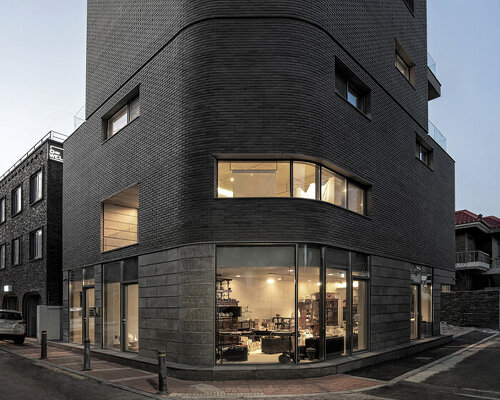 gray brickwork envelops curved 'S gallery' residence near seoul forest