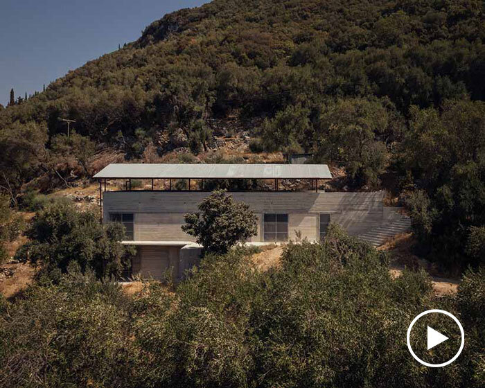 corrugated steel roof shades concrete house by invisible studio in greek island's olive grove