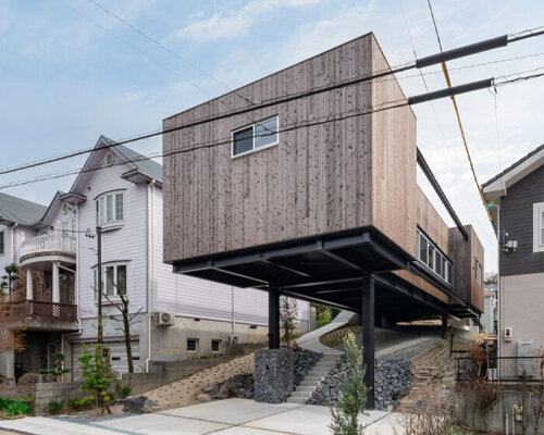 nanometer architecture shelters micro-garden under stilted 'house off the ground' in japan