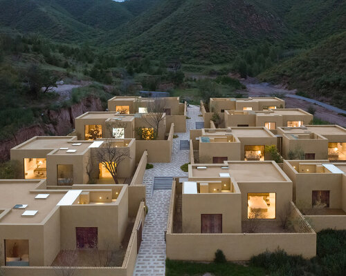 geometric house sculptures emerge from earth for CPLUS' village renewal project in china