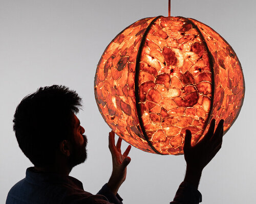 leather-like material from citrus waste wraps pendant lamp at london design festival