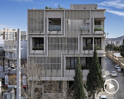 perforated brick facade by mohat office brings texture to iran's residential skyline