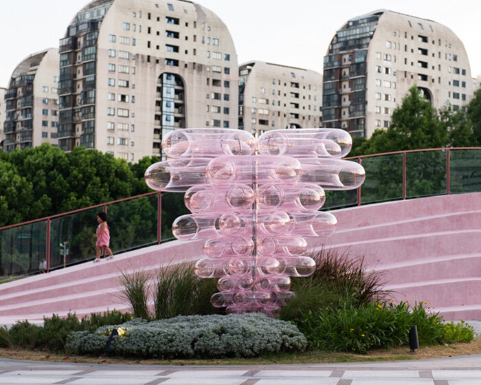 pink acrylic bubbles by naoonaoo compose undulating installation along suzhou's waterfront