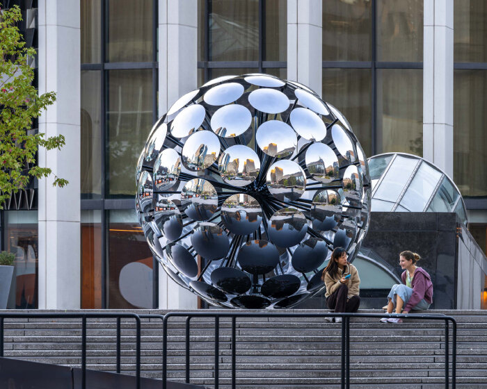 SpY's steel and glass ORB installation reflects fragments of urban montreal