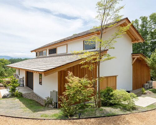 wooden windows transform residence by sobokuya inc. into gallery of japanese landscapes