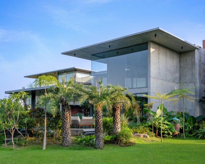 water features and greenery wrap hiren patel architects' house in india in serenity