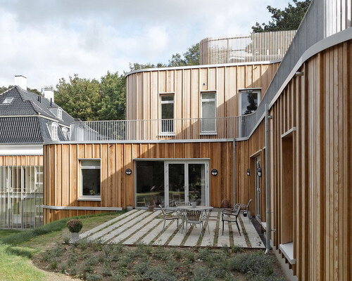 JAJA architects builds modern home for families in need along denmark's bagsværd lake