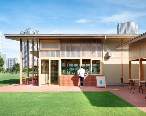 cluster of intimate wooden huts shape schemata architects’ blue bottle café in tokyo park