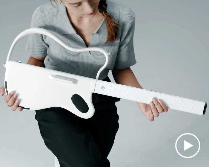 detachable sampler guitar LAVA GENIE has no strings attached so users play by tapping it