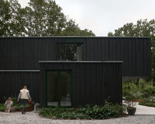 floating timber volume crowns forest house by kumiki architecture in the netherlands