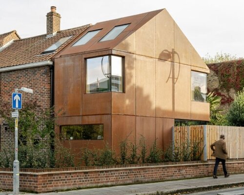 rusty corten steel extension by fluid glass modernizes 1950s brick home in london