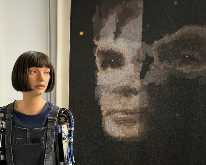 Ai-Da's alan turing painting makes history as first work sold by humanoid robot at sotheby's