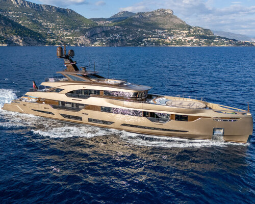 hybrid yacht ANJELIF glows in daylight with champagne-colored aluminum exterior