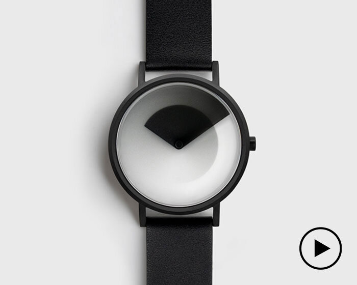 two overlapping gradients in lawa design's analog watch translate time into different patterns