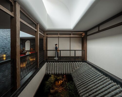 water ponds and courtyards in tanzo space's meng du hui restaurant evoke bamboo garden